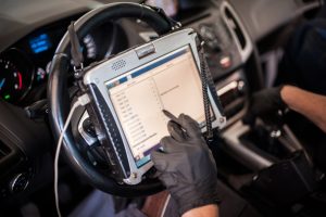 Automobile,Computer,Diagnosis.,Car,Mechanic,Repairer,Looks,For,Engine,Failure