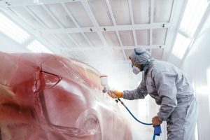 A,Car,Service,Worker,Coats,A,Car,With,Varnish,Using