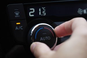 Set,Up,Air,Conditioner,In,The,Car.,Hand,Turns,Air