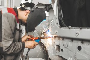 Metal,Working,Car,Body,With,Carbon,Dioxide,Welding,Machine.,Repair